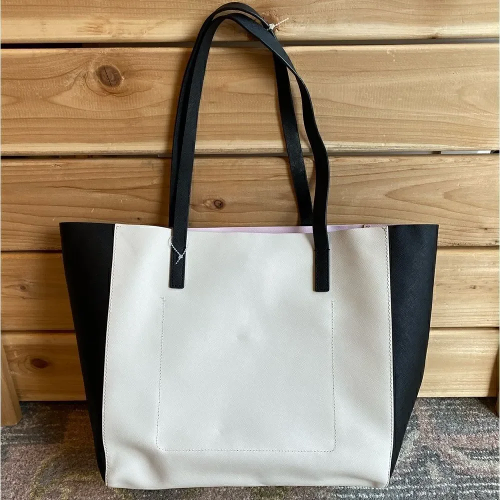 Kate  Spade  Purse with Bow color bag is Black and White